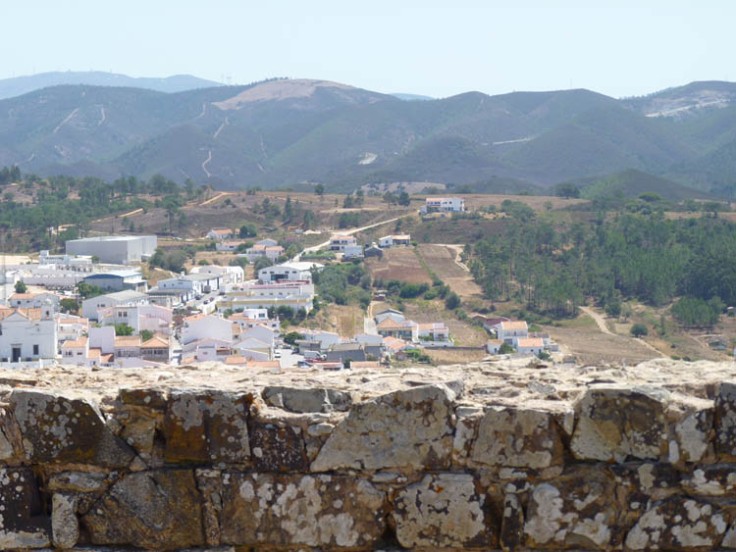 From the ancient castle walls to the historic town of Aljezur, and to the mountain of Monchique beyond.