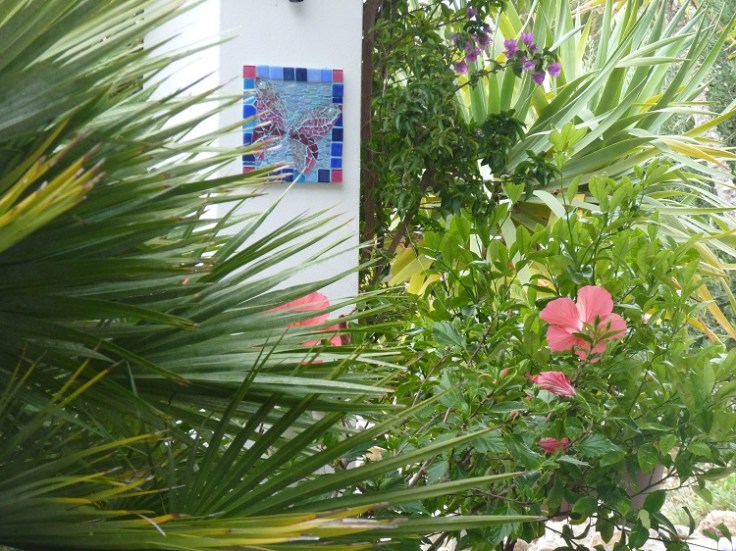 Mosaic butterfly using glass tiles