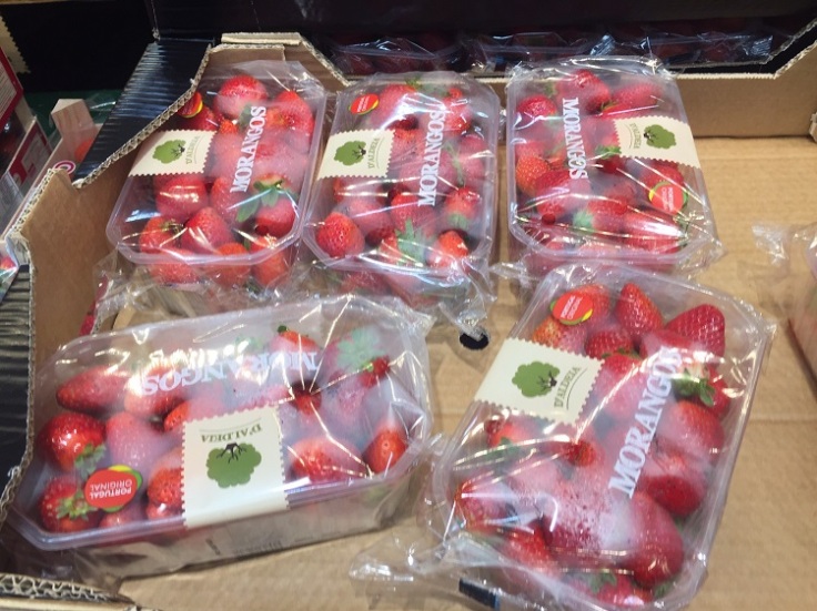strawberries in plastic packaging