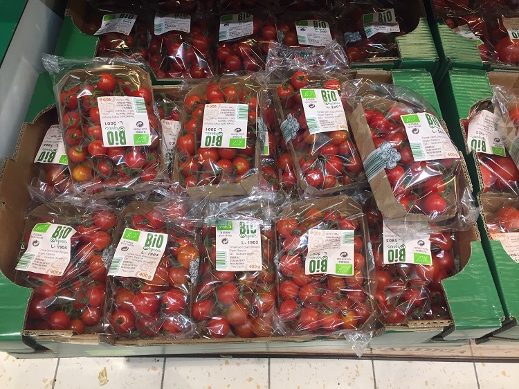 Tomatoes sold in plastic boxes